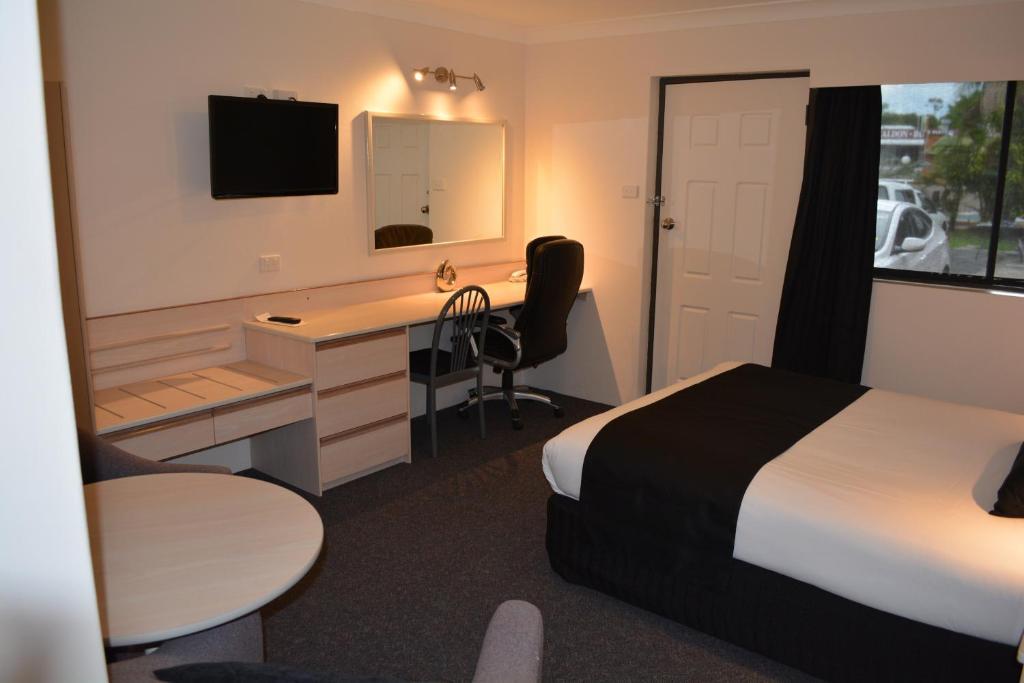 Alabaster Motor Inn Тарий Стая снимка