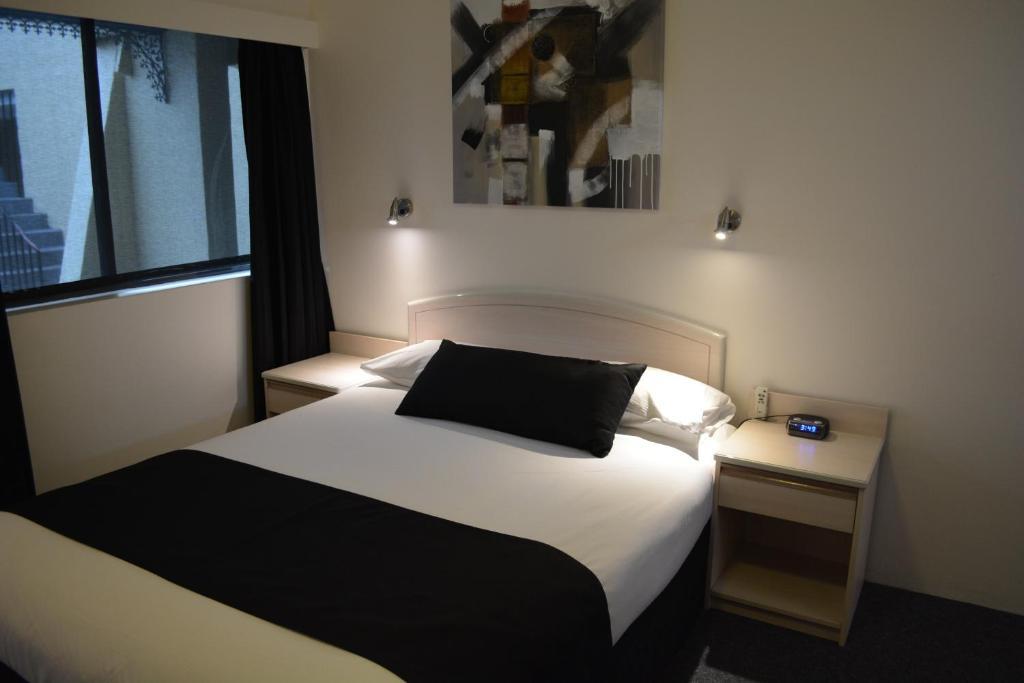 Alabaster Motor Inn Тарий Стая снимка
