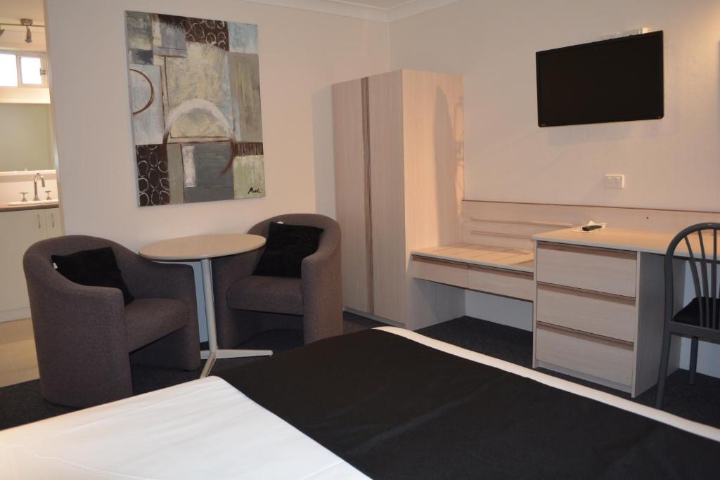 Alabaster Motor Inn Тарий Стая снимка